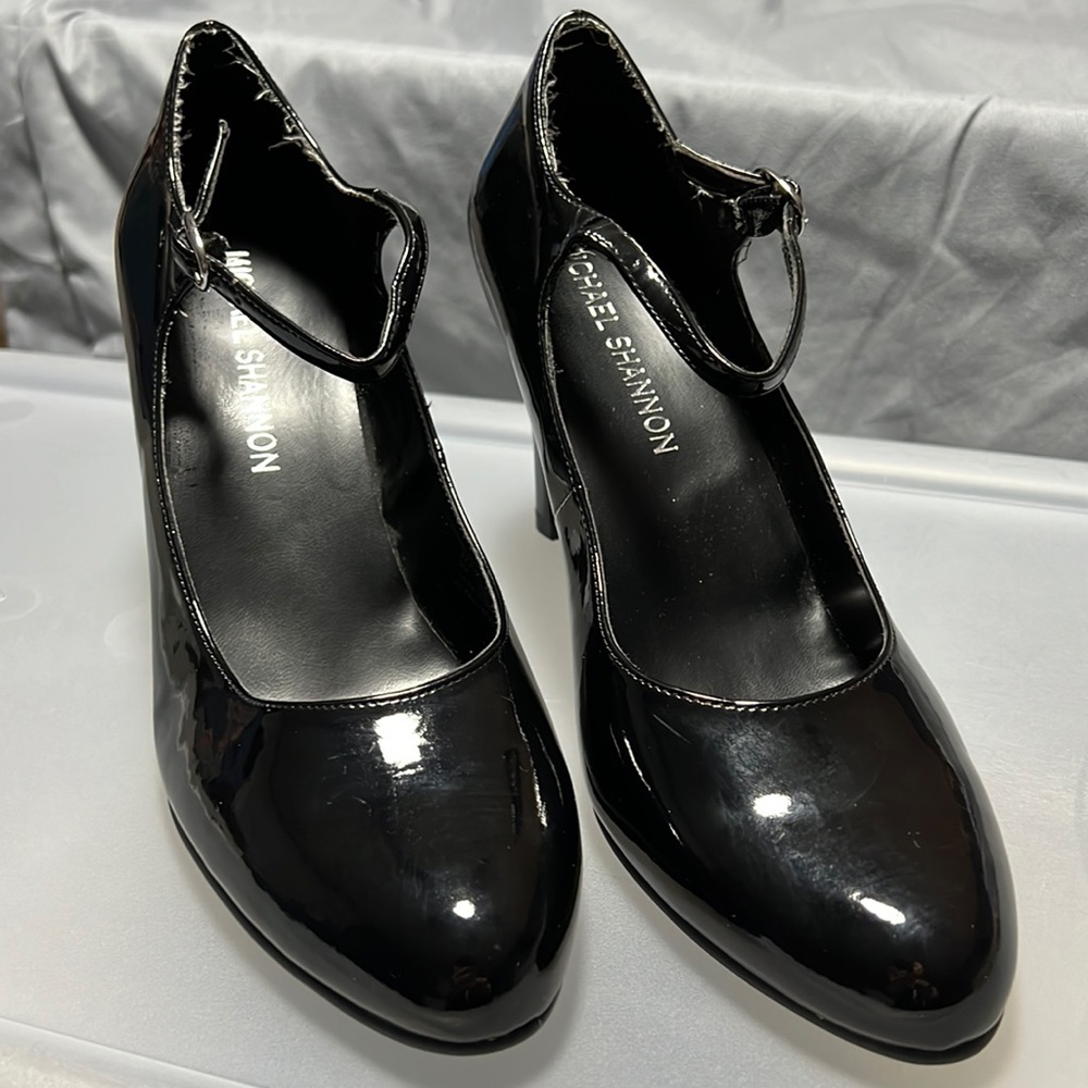 NWOT - black patent leather heels with ankle strap. Size 9.